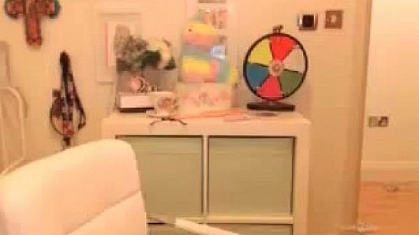 Big-tits redhead rubs clit on webcam
